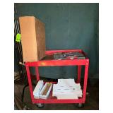 Red rolling metal cart