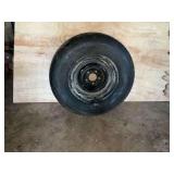Like new trailer ST225/75R15 on a 5-hole Ford wheel