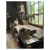 Contents of workbench, 19" x 26" x 2" thick steel block