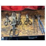 Tin snips and fencing pliers