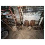 Contents of corner: blade for garden tractor, bicycle parts