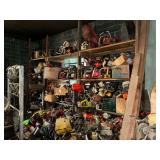 Large collection of used chainsaw pieces and parts