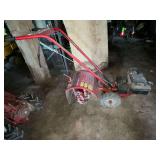 Troy-Bilt pony rear tine tiller, has compression
