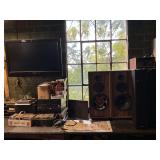 Phillips TV with remote, CDs, Harmon Kardon receiver, JVC 5-disc changer