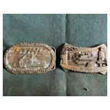 Pair of Stihl belt buckles