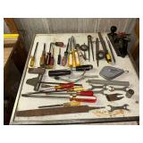 Chalk tape, files, block plane, screwdrivers, wire wheel, etc.