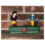 Cast iron golfing bank