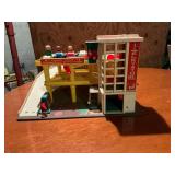 Fisher-Price Parking Ramp Service Center with cars and people