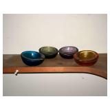4 heavy colored glass ashtrays