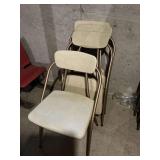 Four Stylaire by Hamilton Cosco folding chairs