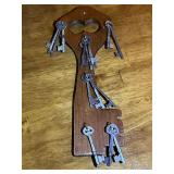 Wooden key with skeleton keys, clock key