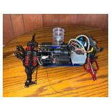 Traxxas 4-wheel drive car chassis with engine and radio receiver