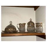 Cut glass pieces with gold accent