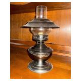 Oil lamp with metal base and shade