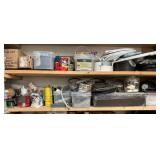 2 shelves of plumbing accessories