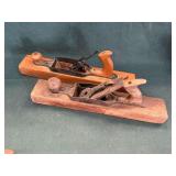 Pair of wooden body planes, one missing knife