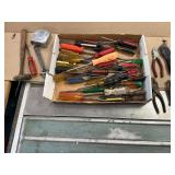 Screwdrivers, tape measure, hammer, pliers, allen wrenches, etc.