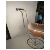 Vintage tin baby buggy