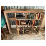 Vintage books and wood bookshelf