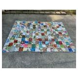 Tied patchwork quilt, some damage