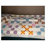 Vintage machine quilted 9-patch quilt