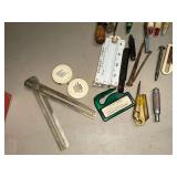 Railroad tie nails, plastic bottle openers