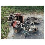 Crow bars, hammers, sausage stuffer, extension cord, etc.