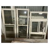 3 wood framed windows