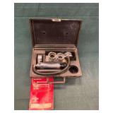 Stant cooling system pressure tester with  gauge.