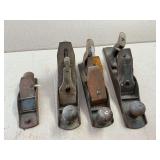 4 wooden planes, Stanley No. 4 and 3 unmarked.