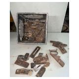 Assortment of carpenter plane parts