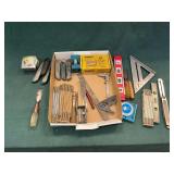 Rulers, levels, combination square, knives, tape measure, etc.