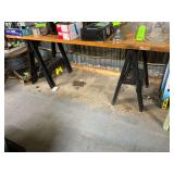 Plastic saw horses and door, CONTENTS NOT INCLUDED