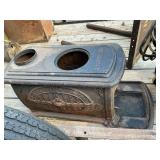Comstock cast iron stove, no top or legs, or door.