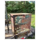 Metal cabinet on casters with contents