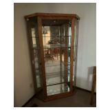 Lighted corner curio cabinet