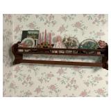 Hanging quilt rack with shelf and contents