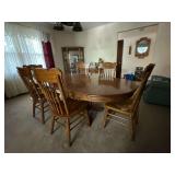 Dining room table and 6 straight chairs