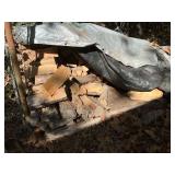 Firewood pile outside shop