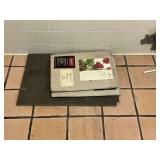 Contents of laundry room, cleaning supplies, mops, brooms