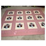Patchwork quilt, machine quilted