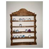 Golf ball display shelf with golf balls