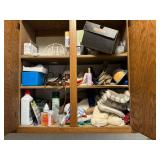 Contents of laundry room, cleaning supplies, mops, brooms