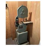 Delta band saw on stand