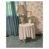 Pair of lamps on pressed wood table