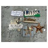 Assortment of metal and wood signs, lake and beach, etc.