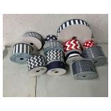 Rolls of blue, white and red wired decorative ribbon