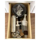 Pampered Chef items, chopper, cookie press, bread molds