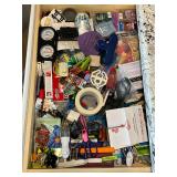 Junk drawer, clips, scissors, night light