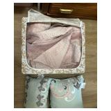 Periea zippered tote of bed spread and pillows